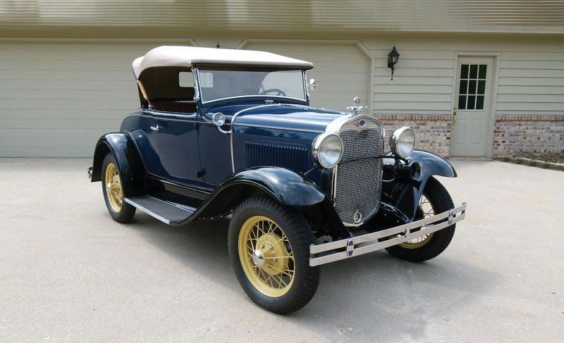 1931 Ford Model A Deluxe Roadster: 200 cid four-cylinder L head engine with Zenith carburetor, 40 HP, three-speed manual transmission, solid axle single transverse semi-elliptical leaf springs; wheelbase:103.5” Open cars of all body