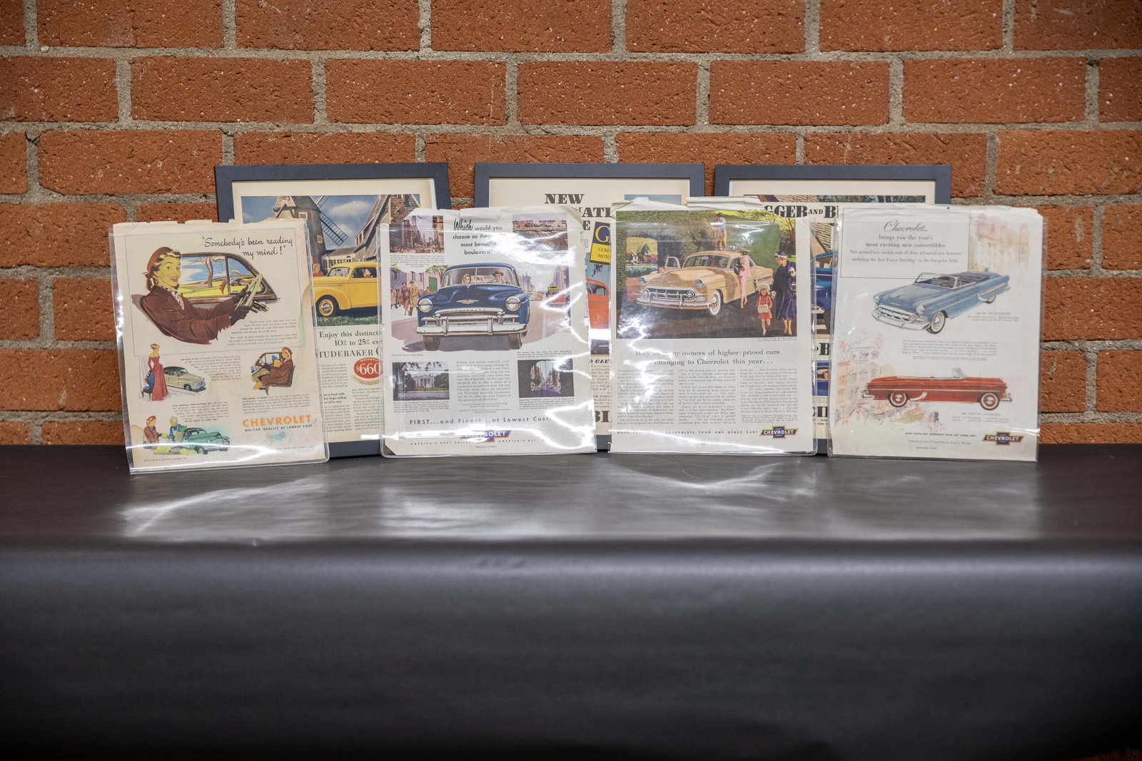 Framed and Sleeved Automotive Ads: Framed and Sleeved Automotive Ads - Offered Without Reserve ---- ITEM IS LOCATED IN EL SEGUNDO, CA ITEMS MUST BE PAID FOR AND REMOVED 5 DAYS AFTER THE AUCTION DATE. ANY ITEMS LEFT AFTER THAT WILL BE S