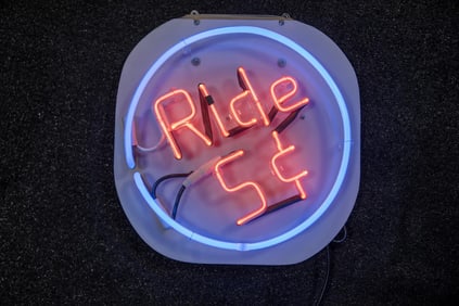Custom "Rides 5¢" Neon Sign
