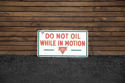 Conoco "Do Not Oil While in Motion" Single-Sided Porcelain Sign