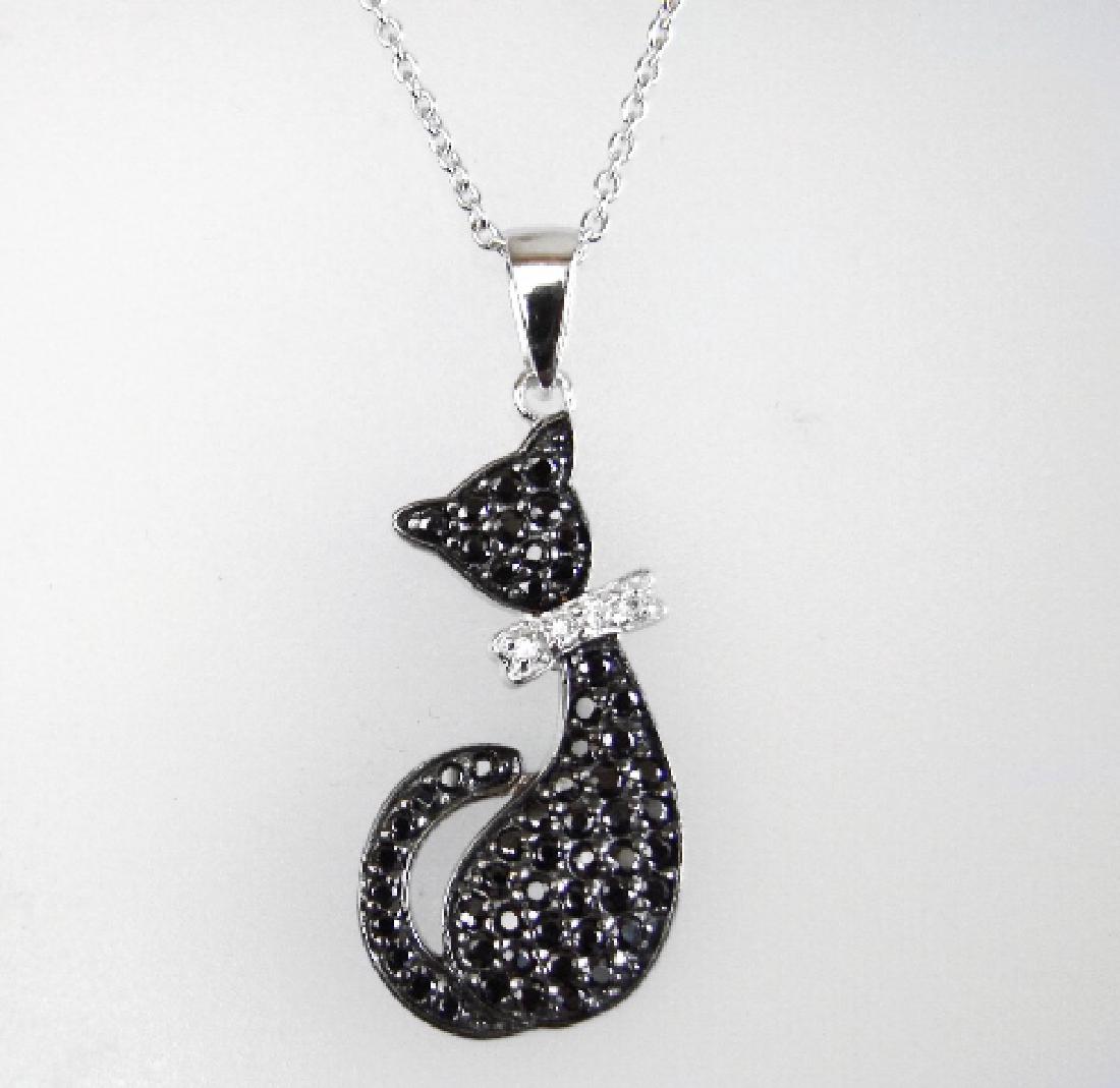 Creation Diamond W/B 1.62 CT Necklace 18k Y/G Overlay: Gem: Creation White/Black Diamond Qty: 1 Item: Necklace Length: 18." Pendant size: L 30Xw12mm Stone weight: 1.62 carat round (Clarity: F/Opaque, Color: G, Black) Metal: 18k white gold overlay 925 silv