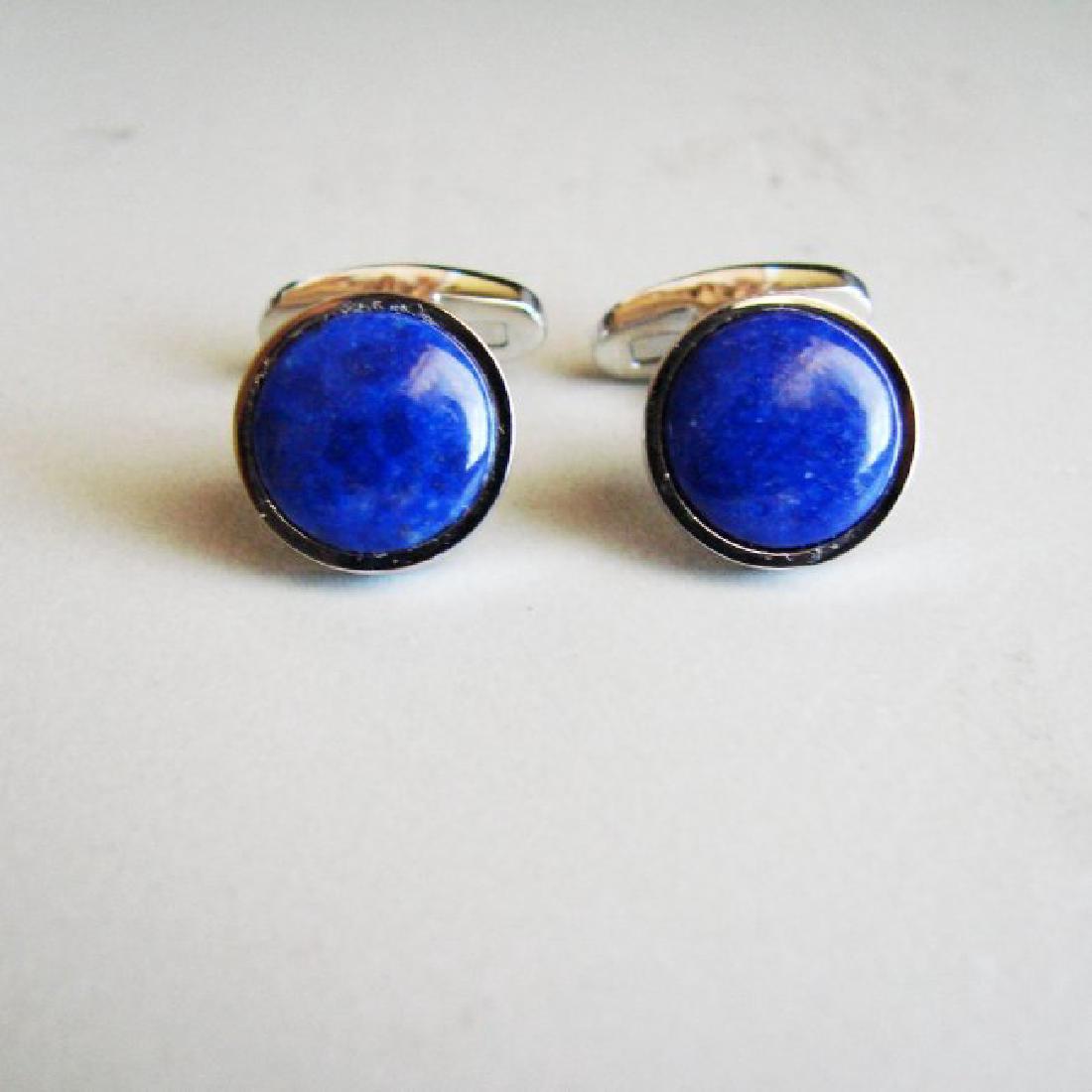 Men Cufflink Slainless Natural Labradorite Oval 18.45Ct: Men Cufflink Stainless Steel Lapis Lazuli Measurement: 12 mm Cut Cabochon Round Weight: 6.78 Carat Shape: Round Clarity:Opaque,Color:Blue,Treatment: None Cufflink Size: L 1"inch x W 14.3 mm Metal: Sta