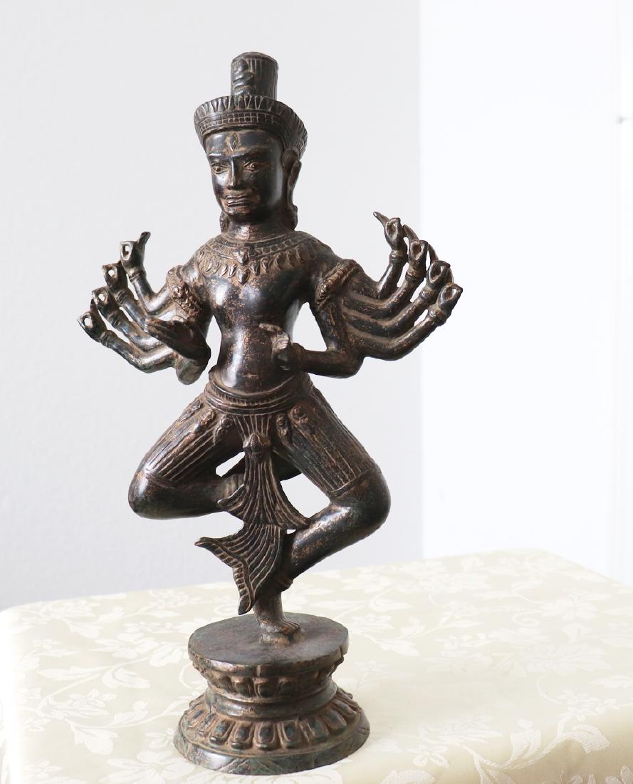 Khmer Angkor,Buddha Brass King Statue 12th Century: Khmer Angkor,Buddha Brass King Vihnu With 10 Arms Statue 12th Century Antiques by Handcrafted Collection item Color:Gold Black Texture Material: Solid Bronze Height: 15" x Width: 8.5"inch Weight: 4.50