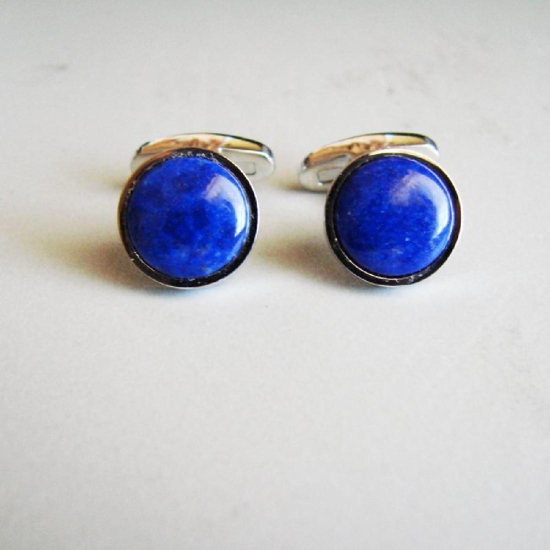 Men Cufflink Slainless Natural Labradorite Oval 18.45Ct: Men Cufflink Stainless Steel Lapis Lazuli Measurement: 12 mm Cut Cabochon Round Weight: 6.78 Carat Shape: Round Clarity:Opaque,Color:Blue,Treatment: None Cufflink Size: L 1"inch x W 14.3 mm Metal: Sta