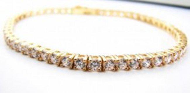 Creation Diamond Tennis Bracelet 8.40Ct 18k Y/g Overlay: Creation Diamond Tennis Bracelet High Quality 56 pieces Weight:: 8.40 Carat Round Brilliant Clarity: VVS,Color: F Setting: Prong Metal: 18k Yellow Gold Overlay 925 silver(4.00grm) Length: 7" Lock: Hid
