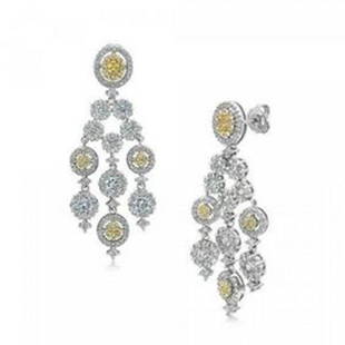 Creation, W/Y Diamond Chandelier Earrings 1.90CT 18K W/g: Item: Chandelier Earrings Length: 1.80 inches Width: 70mm White Stone: 1.30 Carat round brilliant Clarity: VS1, Color: F Yellow Stone: .60 Carat round brilliant Clarity: VSI, Color: Yellow