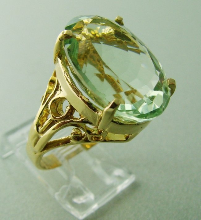 Green Amethyst Ring 12.14 Carat 14k Y/g: Gem Type: Natural Amethyst Item: Ring Quantity: 1 Green Amethyst: 12.14 Carat oval Shape Clarity: VVS Color: Light Green Treatment: Treated Origin: Brazil Hardness: 7 Gold: 14k yellow gol