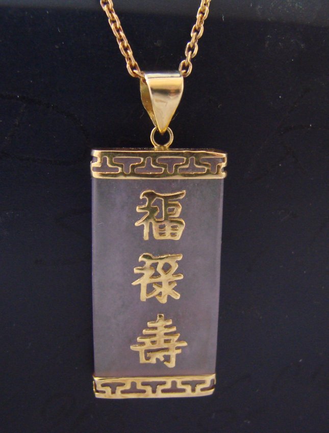 Lavender Jade Pendant Has chianese Letter 14k Y/g: Culture Jade Item: Pendant Size: 1.2" length x1/2 width x 2mm depth Quantity: 1 Grade: A Clarity: Transparent Color: Natural Lavender 14k solid yellow gold and (1.75grm) Pendant will come with a chai