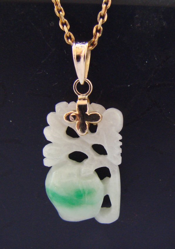 Natural Caved Mango Fruit Jade A+ Pendant 14k Y/g: Natural Jade caved mango fruit pendant Gem Type: Natural Chinese Culture Jade Item: Pendant Size: L 15 x1/2 W x 2mm depth Quantity: 1 Grade: A+ Clarity: Transparent Color: Natural green and white text