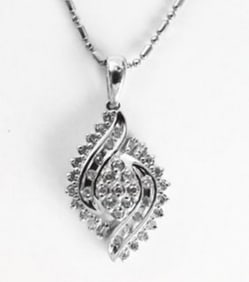 Diamond Unique Pendant: .55 Carat 10k W/g