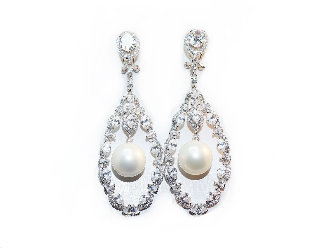 Creation Diamond 7.13Ct/Swarovski Pearl 12mm18k W/GOver: Gem Type: Creation white Diamond and Swarovski Pearl Item: Earrings/Length: 2.70 inches /Width: 25mm 2 Oval Stone Weight: 2.40 Carat, Size: 8x6mm, Clarity: VS1, Color: G 20 Marquise Stone Weight: 3.60