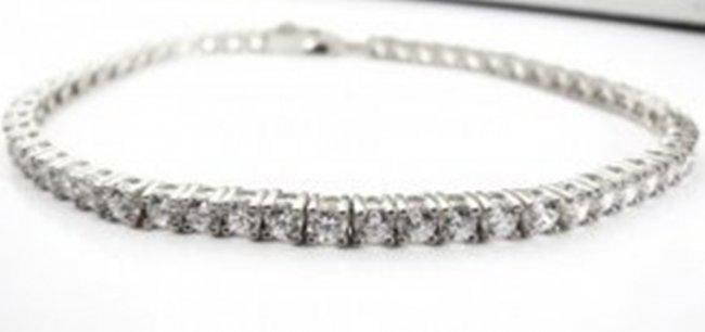 Creation Diamond Tennis Bracelet 8.40Ct 18k W/g Overlay: Creation Diamond Tennis Bracelet High Quality 56 pieces Weight:: 8.40 Carat Round Brilliant Clarity: VVS,Color: F Setting: Prong Metal: 18k White Gold Overlay 925 silver(4.00grm) Length: 7" Lock: Hidd