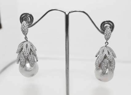 Cultured Baroque Pearl/Creation-Diamonds Earrings 1.00 Ct 14k W/g Overlay 925: Gem: Natural Cultured Baroque Pearl/Creation, diamond Item: Earrings Baroque Pearl: 15mm-Luster: Good-Color: White Creamy Small Stone: 1.00 Carat round brilliant Length: 1.70” Metal: 14k white g