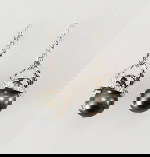Baroque, Tahitian Pearl Earrings 18k W/g Gold Overlay: Gem Type: Tahitian Pearl/ Creation whit Diamond Stones Total: Approximately 2.95 Carat, Clarity: VS1, Color: F Luster: very good, Size: 14mm Color: Blak/Gray/Light Green Length: 1.5 inches, Width: 70