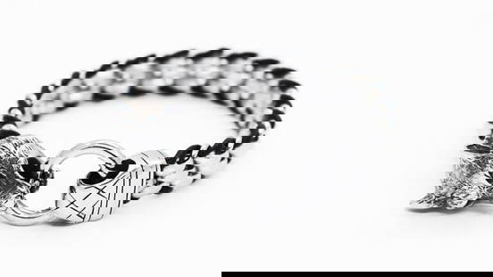 Man's Fox Head Stainless Steel/Black Robber Bracelet: Quality: 1 Item: Fox Head Bracelet Weight: 60 grams Width: 12 mm Thickness: 7.5 mm Length: 8.5 inches Color: Antique Designs: Fox Head Lock: Ring Lock Metal: Stainless Steel, This item m