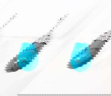 Natural Turquoise Earrings 18.20Ct 18k W/g Overlay: Gem Type: Natural Turquoise,Creation Diamond Qty: 1 Pairs Item: Earrings Creation Diamond 70Pce Weight: 1.40 Carat round Brilliant Clarity: VS, Color G Turquoise weight: 16.80 Carat Pear Drop Shaped (