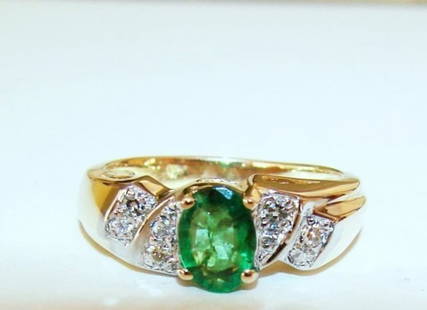 Emerald Ring 1.00Ct & Diamond .25Ct 14k Y/g: Gem Type: Natural Emerald Item: Ring Emerald 1.00 carat Oval Shape Clarity: SI,Color: Green,Treatment: Oiled Origin: Columbia Hardness: 7 8 Pieces Diamond: .25 carat Round brilliant Clarity: SI1,Color