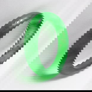 Translucent Solid Green Chinese Jade Bangle Size: 7: Gem Type: Natural Translucent Solid Chinese Jade Grade: B Item: Jade Bangle, Size 7 Outer Diameter: 75mm Inter Diameter: 60mm Width: 16.4 Thickness: 8.5 mm Weight 61.08 grams Treated: Untreated<