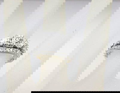 Present Past Future diamond Ring 2.58Ct 14k W/g: Gem Type: Natural Diamond Weight: 2.58 Carat Round Brilliant Center: .64 CT, Size: 5.6mm, Clarity: SI1, Color: G 2 diamond side by side: .46 CT 4.2mm, Clarity: SI1, Color: G Small 46 diamonds on the b