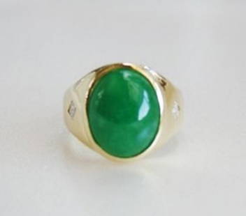 Man's Jade Ring Diamond: .20Ct/Jade 9.26Ct 14k Y/g: Gem Type: Natural Diamond/ Chinese Jade Qty: 1 Item: Man Ring (Size: 9) Diamond: .20 Carat Princess Cut Clarity: SI1, Color: H, Treatment: None Jade: 9.26 Carat oval shaped(Size: 15x10x6.5mm) Grade: A