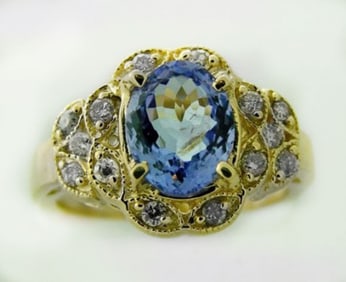 Tanzanite Ring: 3.60 Carat & .42 Carat 14K Y/g