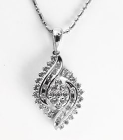 Diamond Unique Pendant: .55 Carat 10k W/g