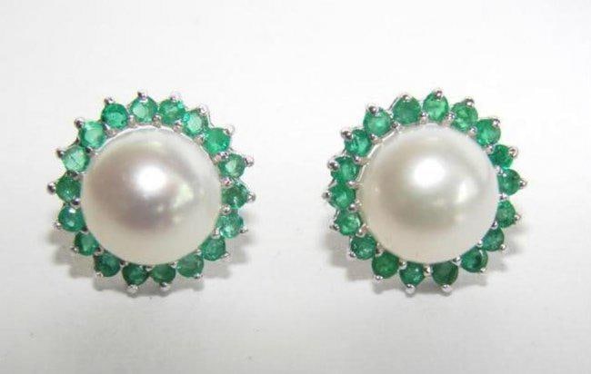 Akoya Pearl Earrings 8.5mm With Columbia Emerald .80Ct: Gem Type: Akoya Culture Pearl/Columbia Emerald Quantity: 1 Pair Emerald: .80 carat round Columbia emerald (Clarity: Transparent Color: Green Treatment: Untreated) 8.5 mm Akoya Pearl (Clarity: A, Color