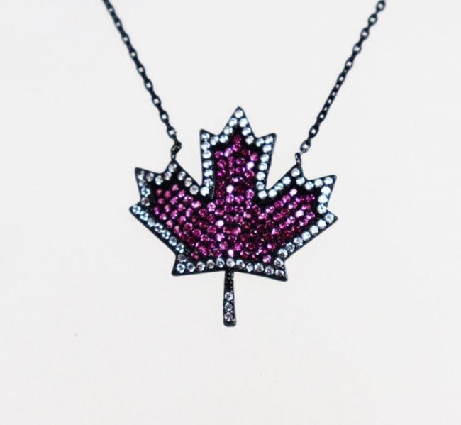 National symbols of Canada 18k Antique Gold Overlay: Item: Necklace Stone: Creation, Ruby Clarity: Transparent Color: Red Metal: 18k Antique Gold Overlay 925 Length: 17 inches This item was handmade