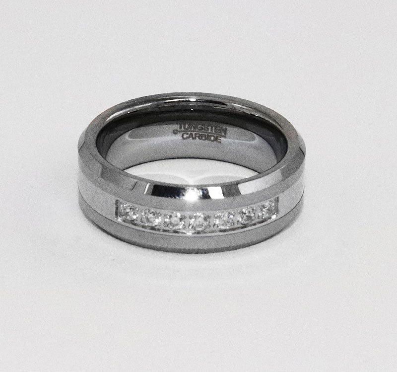 Tungsten Comfort Ring Creation, Diamond .28 Carat: Item: Comfort Ring Gem Type: Creation, Diamond Weight: .28 carat round brilliant Clarity: VSI, Color: H Setting: Prong Size: 10 Width: Almost 7.8mm Polished: High Polished Beveled Edge Condi