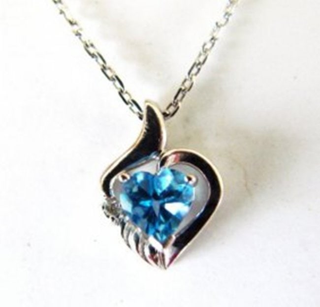 Swiss Blue Topaz Diamond Heart Pendant .37Ct 14k W/g: Gem: Natural Blue Topaz and Diamond Qty: 1 Topaz Weight:.35 Carat Heart Shape Clarity: VS-Color: Swiss Blue-Treatment: Irradiated 1 Pieces Diamond Weight:.02 Carat Round Clarity: SI1-Color:H-Treatment