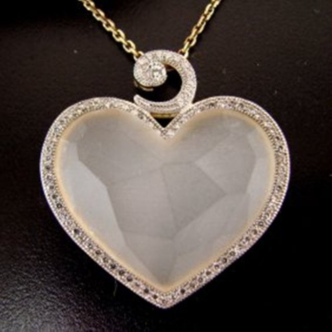 Creation Diamond Moon Pendant 32.90Ct 18k Y/g Overlay: Creation Diamond High Quality Item Item: Pendant Diameter: L 1.1/4" x W 1.1/4"inch 80 Pieces Round: 1.30 carat (Clarity: VVS, Color: F) Moon Stone: 31.60 Carat Heart Shape Cut: Checkerboard Measuremen