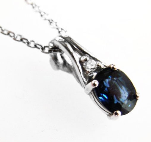 Diamond&Blue Sapphire Pendant 1.39Ct 14k Wg: Gems: Natural Diamonds and Blue Sapphire Diamonds 1 Piece Weight:.05 Carat Round Brilliant (Clarity: VS2, Color: G, Treatment: None) Center Sapphire Weight: 1.34 Carat Oval Facet (Clarity: VVS, Color: