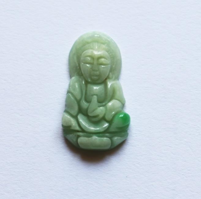 Guanyin Buddha Natural Jadeite Jade Grade A: Natural Jadeite Jade Handwork Carving Guanyin Back Side Carving Smooth Grade: A Item Type: Pendant Origin: Beijing China (Mainland) Color:White and slightly Green Jade Weight:3.10 grams Size:H 26 x W