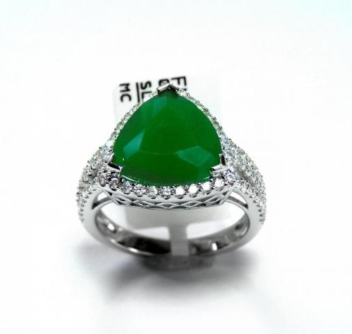 Creation Diamond/Green Onyx 5.56 Carat 18k W/g Overlay: Gem: Creation Diamond/Natural Green Onyx Qty: 1 Item: Rin Face: 13x13mm White stone: 1.00 carat round brilliant Clarity: VVS1 Color: F Natural Green Onyx: 4.56 Carat Trillion shaped Clarity: Fin