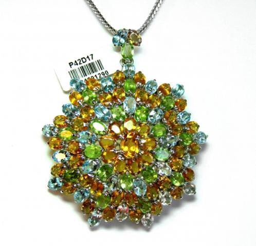 Multi-Colored Pendant 47.CT 18k W/g Overlay: Gems Type: Natural Blue topaz, Peridot. Citrine High Quality Item Hand made by Handicraft Weight: 47.00 Carat (94 pieces, Size:9X7mm to 5x4mm ) Item: Pendant or Brooch Clarity: VSI Color: Multi-Colore