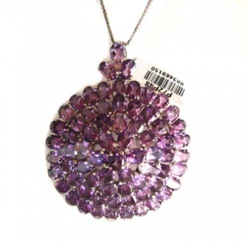 Natural Gem: Amethyst Pendant 41.06Ct 18k W/G Overlay 925 Silver: Gem Type: Natural Amethyst Qty: 1 Item: Pendant Amethyst total weight: 41.06 Carat oval shaped (5X3mm) Clarity: VS2 Color: Violet Cut: Facet Origin: Brazil Material: 18k White gold overlay 925