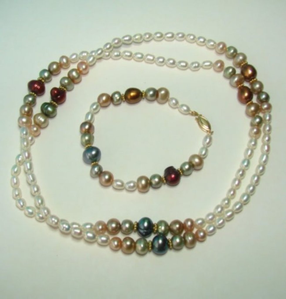 Elegant Multi Color Culture Pearl Necklace: Gemstone: Natural Swarovski Quantity: 1 Size: 7-11mm Grade: AAA Color: Multi Shape: Round Origin: Australian Necklace: 17? 14k yellow gold filled fish clasp no plated Design for fall sea