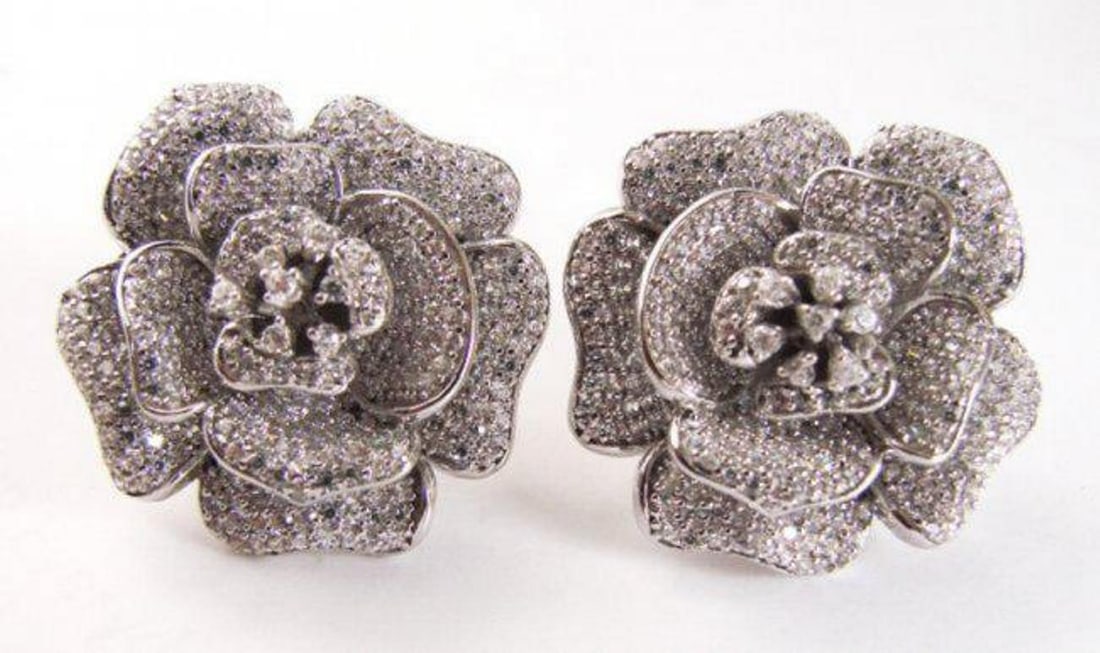 Creation Diamond Flower Earrings 4.92Ct 18k W/g Overlay: Gem Type: Creation Diamond Item: Earrings Weight: 4.92 carat-Clarity: VS-Color F Setting name: Micro Pave Metal: 18k White gold overlay of 925 silver Weight: 14.69 grams-Clips/Backing Earring
