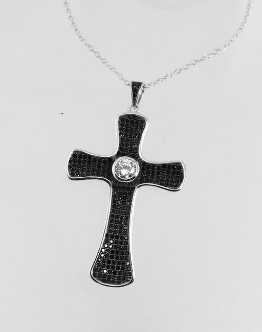 Cross Pendant Creation B/W Diamond 14k W/g Overlay 925: Gem Type: Creation Black/White Diamond Item: Cross Pendant Black Stone: 1.20 Carat round, Clarity: Opaque, Color: Fancy Black White Stone: .40 Carat round brilliant, Clarity: VS1, Color: F 