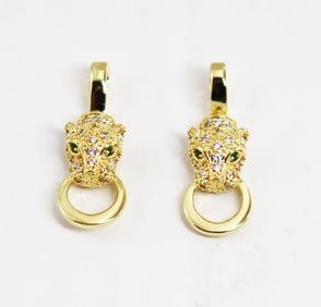 Earrings Creation Dia& Green Garnet 1.52Ct 18k Y/g Overlay: Creation Diamond & Green Garnet High Quality Item Item: Earrings Measurement: L 1" x W 1/2" inch 56 Pieces Weight: 1.40 Carat Round Brilliant Clarity: VVS, Color: F 4 Pieces Green Garnet:.12 Carat Rou