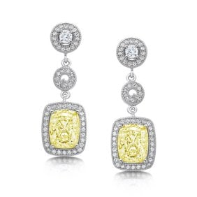 Creation Diamond/Fancy Yellow Earring 4.85Ct 18k W/g Overlay 925: Creation Diamond/Fancy Yellow Qty:Pairs Item: Earrings Diameter: 1.25"x .50" inch 2 Pcs Center stone: 4.25 carat Pear shape, size 9x7 mm Clarity: VSI, Color: Fancy Yellow Creation Diamond: .60 carat R