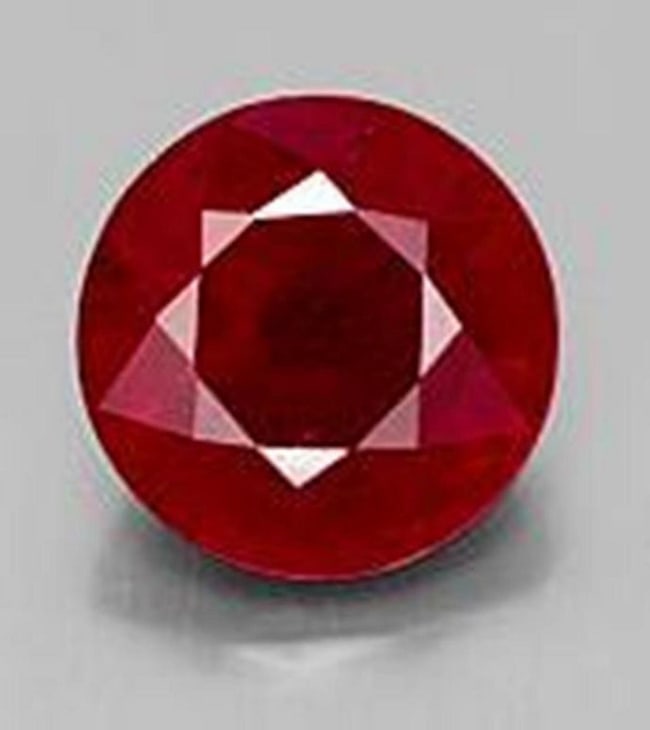 Loose Ruby Round Shape 2.84Ct 8x8x4.8mm: Gem Type: Natural Ruby Qty: 1 Pics Weight: 2.84 Carat Measurement: 8x8x4.7 mm Shape: Round Clarity: Fine Cut: Facet cut Color: Red Pagan Blood Origin: Madagascar Treatment: Fracture Filed 