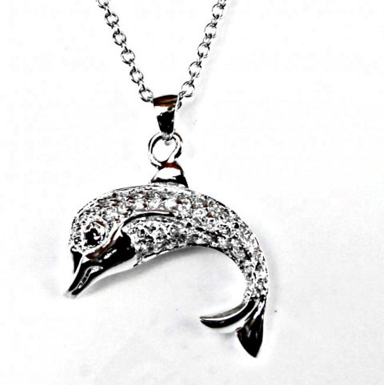 Dolphin Necklace .86CT 18k W/G Overlay 925: Gem: Creation Diamond Qty: 1 Length: 18" Posistion of Pendant: 20x7mm Item: Grown Pendant Stone weight: .86 carat round brilliant Clarity: VVS1 Color: F Metal: 18k white gold overlay 925
