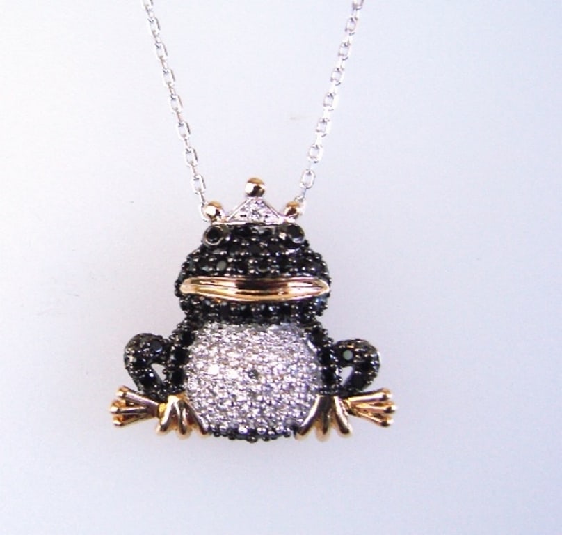 Creation Diamond W/B 1.23 CT Necklace 18k Y/G Overlay: Gem: Creation White/Black Diamond Qty: 1 Item: Necklace Length: 18." Pendant size: L20xW12mm Stone weight: 2.16 carat round (Clarity: F/Opaque, Color: G, Black) Metal: 18k yellow gold overlay