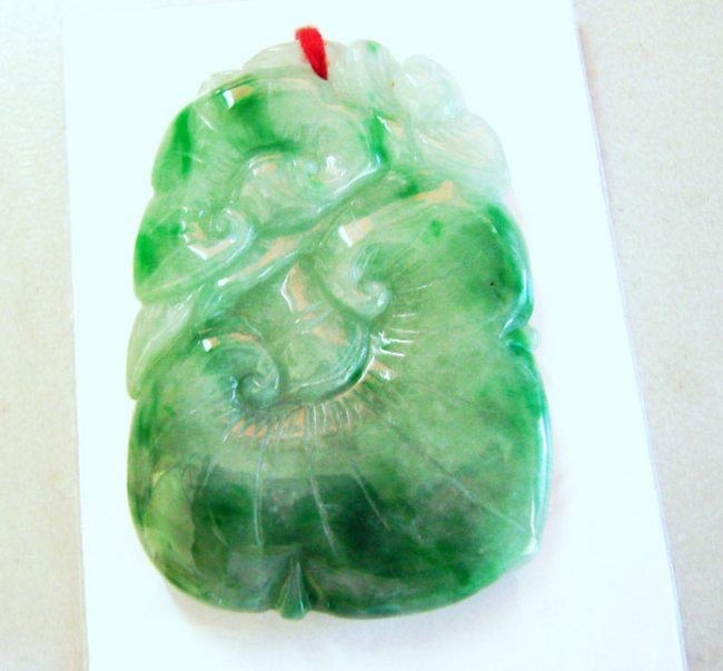 Natural Jadeite Jade Carving Ruyi Imperial Grade: A: Remarks: Natural Jadeite Jade Item: Pendant Jade Grade: A Weight: 41.73 gram Color: Natural Emerald Green and Slightly White Texture Clarity: Transparency Jade Finish: Hand cut and hand High Polish Ja