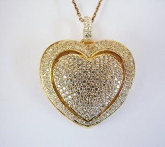 Creation Diamond/Heart Pendant 4.32Ct 18k Y/g Overlay: Gem: Creation Diamond Qty: 1 Item: Heart Pendant Length: 16" Face: 14W x L20 mm Micro Pave Setting Small stone: 4.32 carat round brilliant Clarity: VVS1 Color: F Metal: 18k Y/G gold overlay