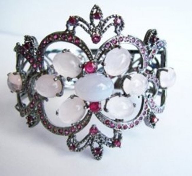 Multi-colors Bangle 38.35 18k B/G Overlay: Gem Type: Natural Cabochon Light Pink/Yellow Facet Cut Ruby/Green Onyx/Yellow Green Prehnite/Amethyst Qty: Gem Type: Natural Cabochon Pink/White Quartz, Facet Cut Ruby/Blue Sapphire Qty: 1 Item: Bangl