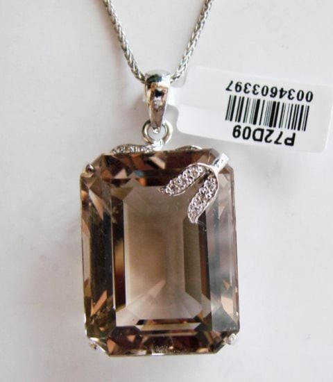 Smoky Topaz Pendant 43.56Ct 18k W/g Overlay: Gem Type: Natural Smoky Topaz/Creation Diamond Quantity: 1 Smoky Topaz: Approx 43.56 Carat (Octagon Shaped, Facet, Size: 27x19x12mm) Clarity: VS1, Color: Medium Brown, Treatment: None Hardness 7 Origi