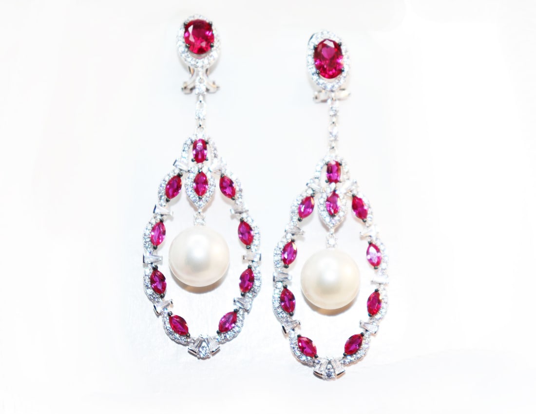 Creation Diamond/Ruby/Swarovski 18k Y/g Over: Gem Type: Creation white Diamond/Red Ruby/Swarovski Item: Earrings/Length: 2.70 inches /Width: 25mm 2. Red Ruby Weight: 2.40 Carat, Size: 8x6mm, Clarity: VS1, Color: Rich Green 20 Marquise Red Ruby, W