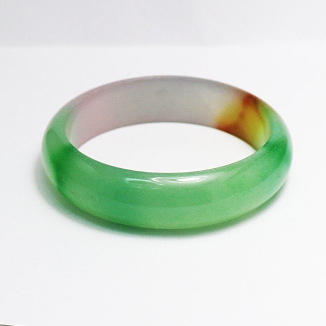 Translucent Solid Multi-Color Chines Jade Bangle: Gem Type: Natural Translucent Solid Chinese Jade Grade: B Item: Jade Bangle, Size 7 Outer Diameter: 75 mm Inter Diameter : 60mm Width: 17. Thickness: 8.5 mm Weight : 59.40 grams Treated: